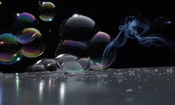Bubbles dance in water, releasing ethereal smoke. A captivating image from the poem 'Soul Feeding'.