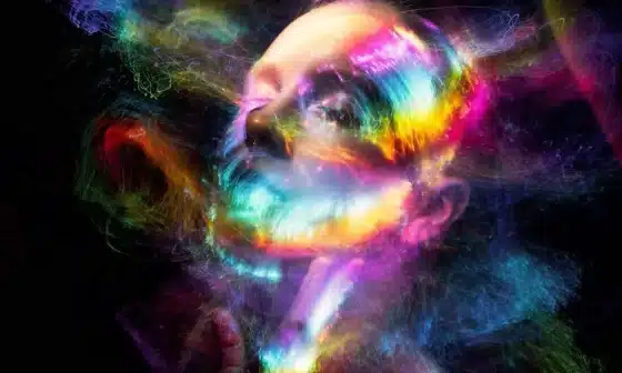 Image of a woman with colorful smoke swirling around her face, embodying strength and faith in the face of destiny.