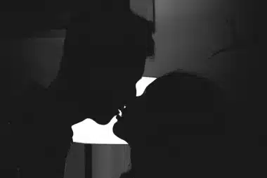 Image of a couple kissing in the dark to go along with the story The Thorny Devil: The Adventures of Griffin & Karen