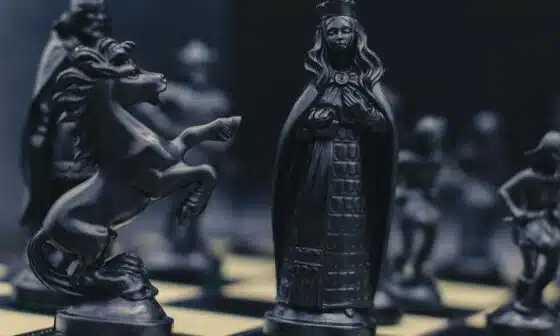 Image of a chess piece black queen that also conveys the dark theme of this short story installment "The Four Corners of Darkness"