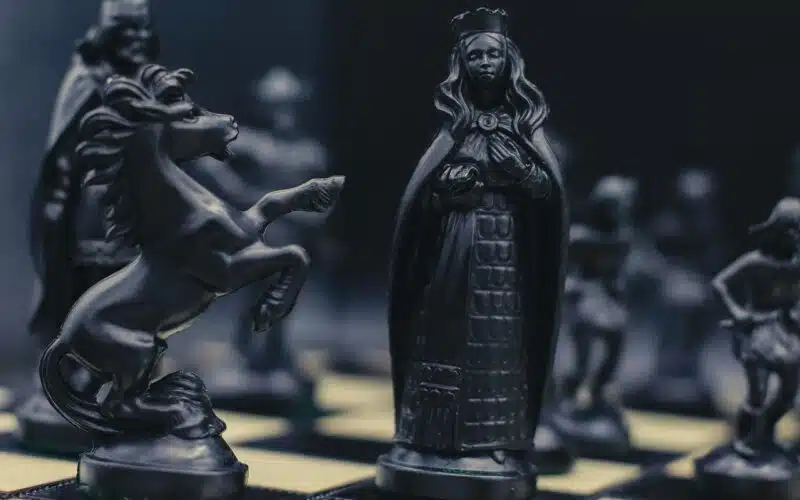 Image of a chess piece black queen that also conveys the dark theme of this short story installment "The Four Corners of Darkness"