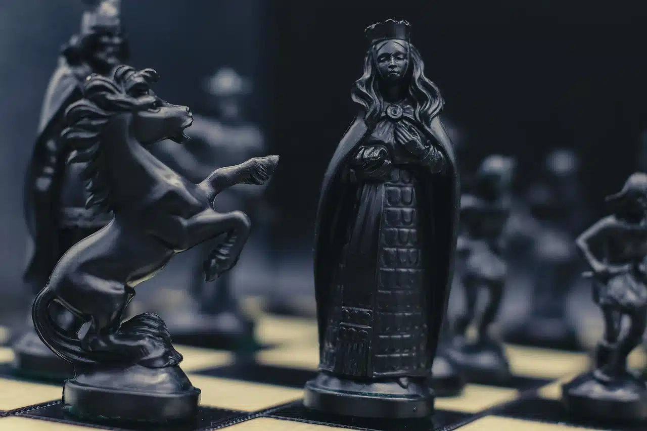 Image of a chess piece black queen that also conveys the dark theme of this short story installment "The Four Corners of Darkness"